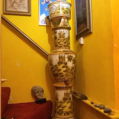 A large Spanish majolica water filter