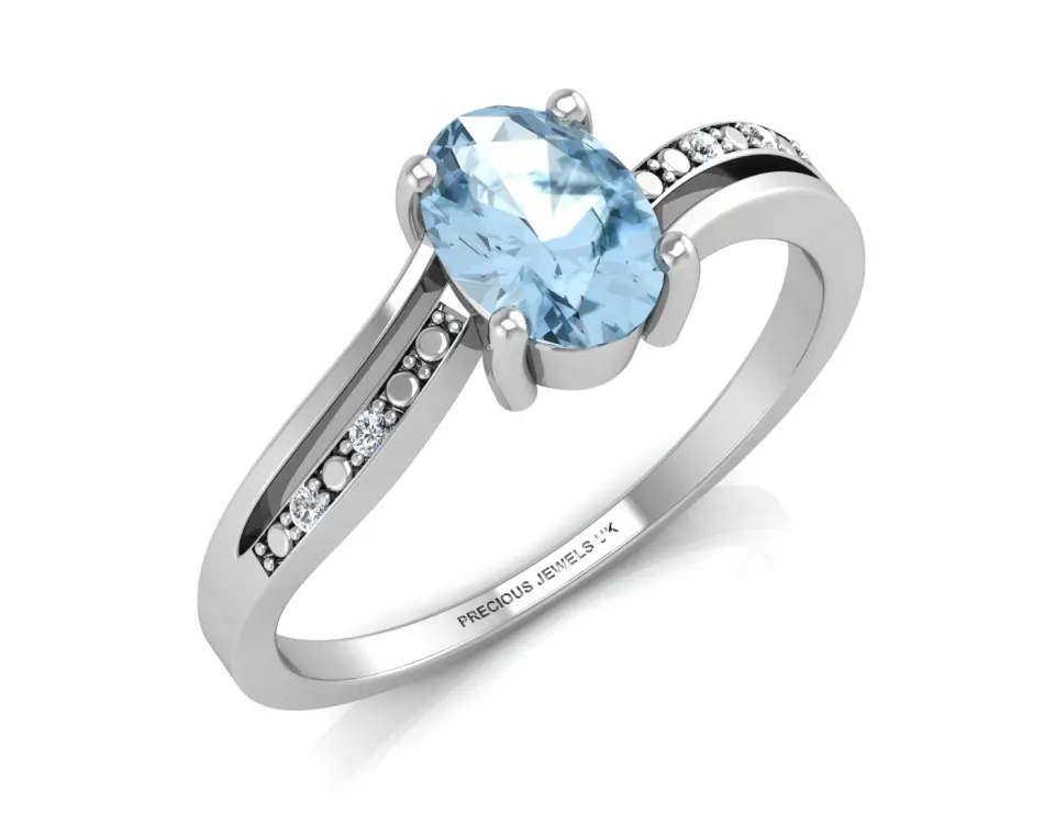 9ct White Gold  Diamond And Blue Topaz Ring (BT1.00) 0.02 Carats