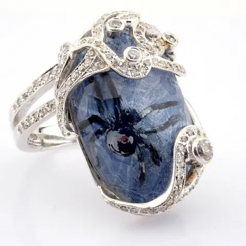 An Exquisite Handmade Gold Ring Intricately Detailed With Topaz, Featuring A Reverse-Engraved Intagl