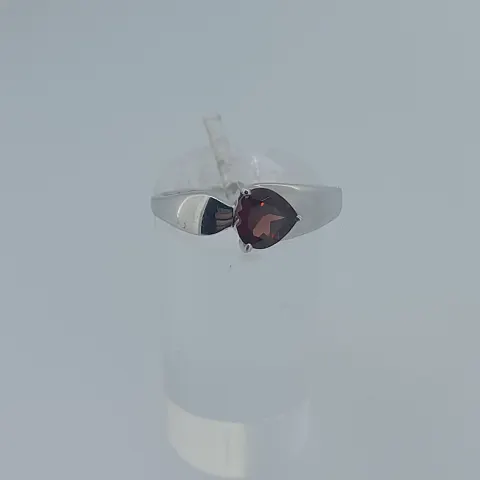 Silver ring set with natural heart shaped garnet stone