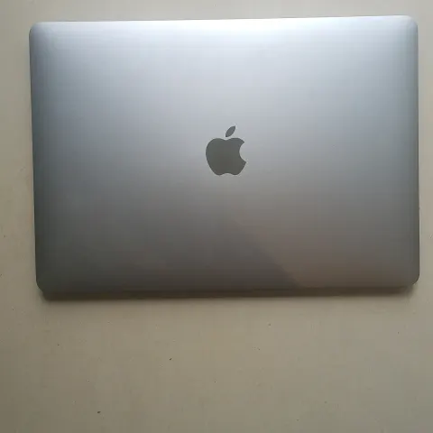 Apple Mac book pro. Untested due to no charger, unboxed, laptop only. No visible breaks on screen