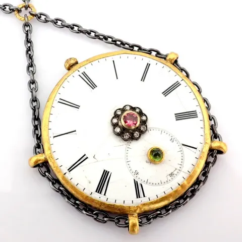 Necklace made of gold and silver with antique watch dial with precious colorful stones and diamonds