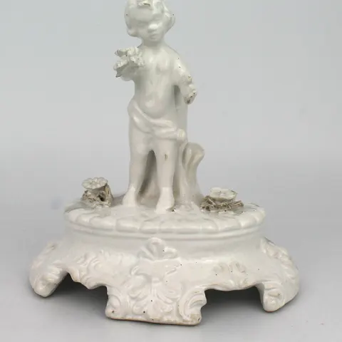 Painted White Porcelain Cherub Figurine