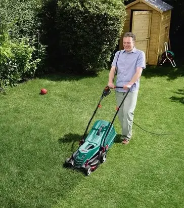 (109/Mez/1G) RRP £120. Bosch Rotak 34-13 Corded Lawnmower. 1300W Motor. Grass Combs Enable Cutting