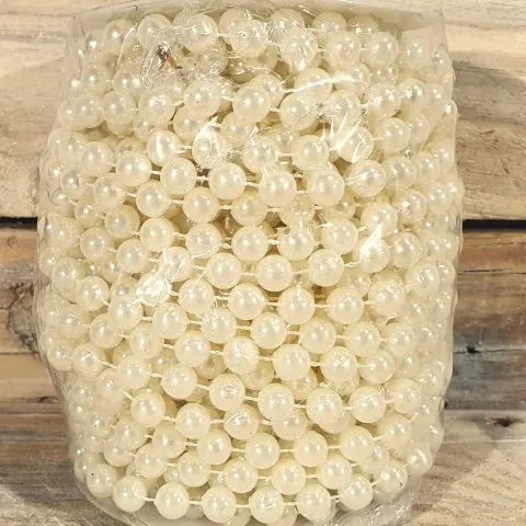 Full roll of 8mm ivory pearl string. Approx 18metres.  Rrp £35.99