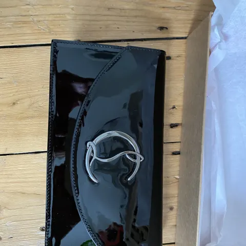 Christian Louboutin Riviera patent leather clutch bag