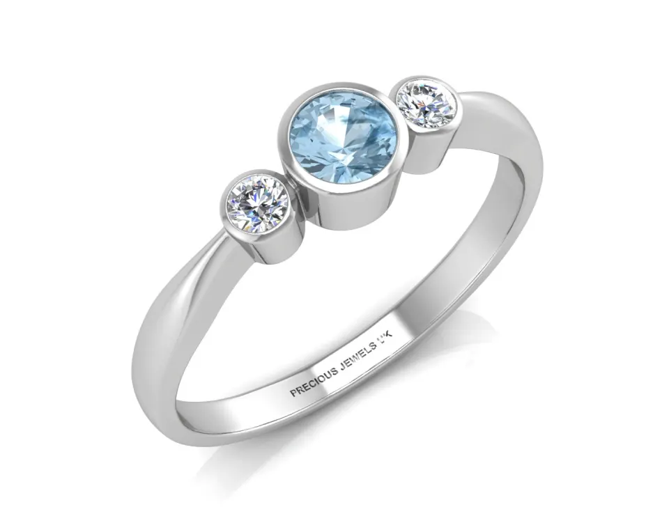 9ct White Gold Three Stone Diamond And Blue Topaz Ring (BT0.35) 0.10 Carats