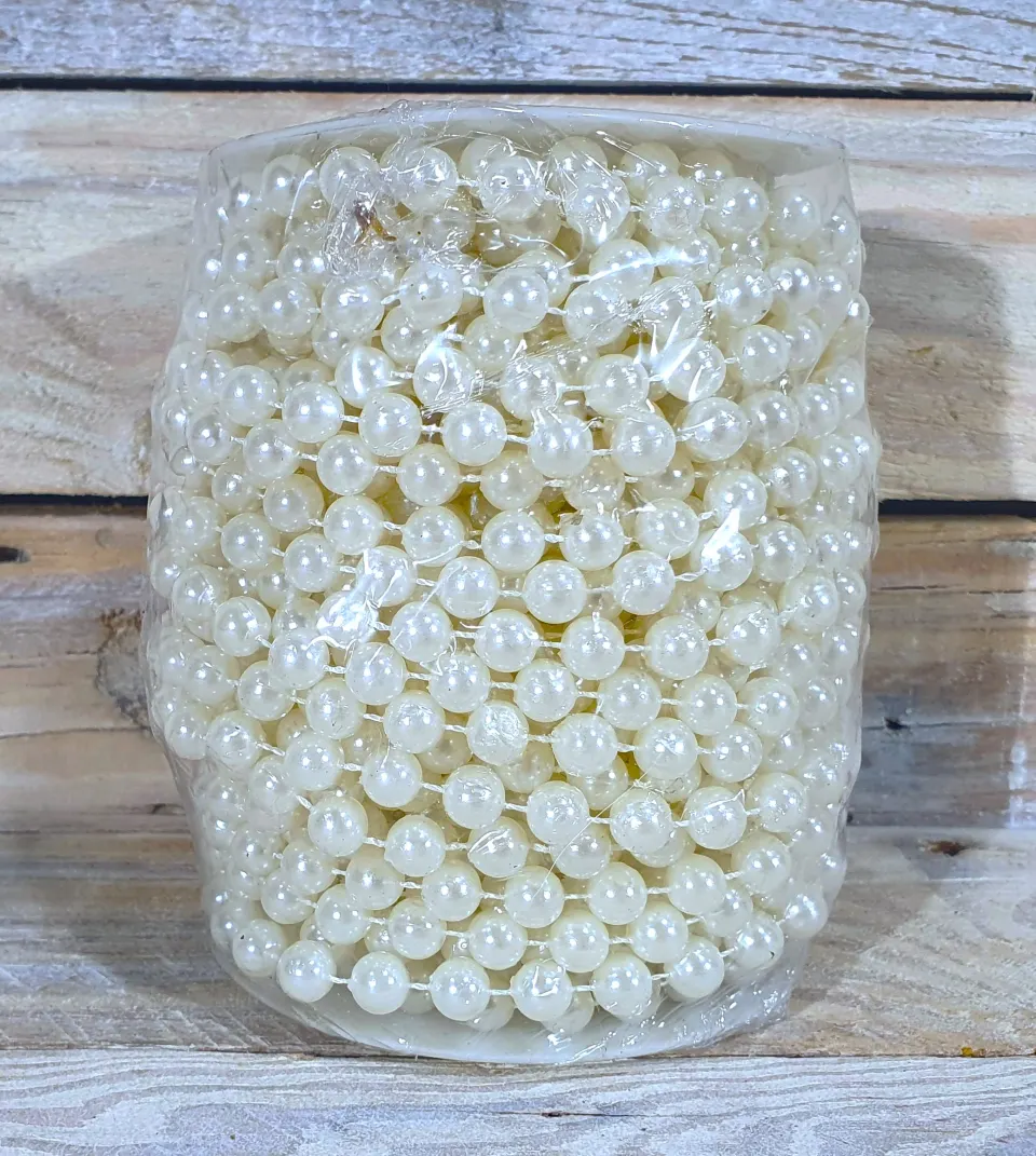 Full roll of 8mm white pearl string. Approx 18metres.