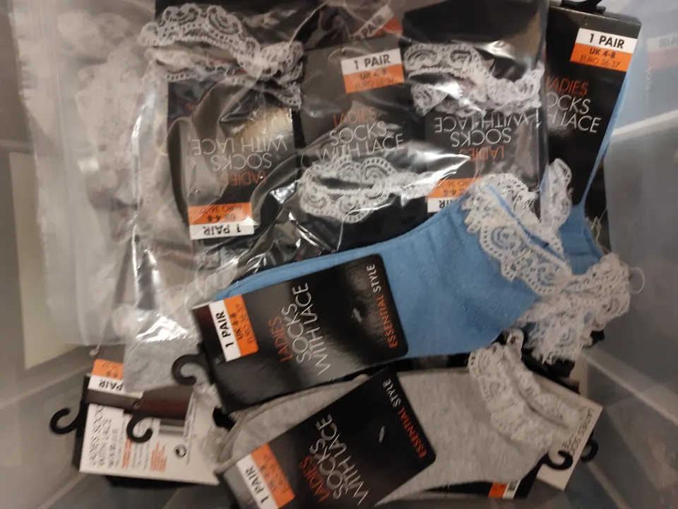 Box of 24 pairs of socks, blue, grey and black with lace edging