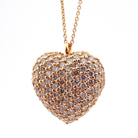 An Exquisite Heart Necklace Detailed With Brilliant Diamonds