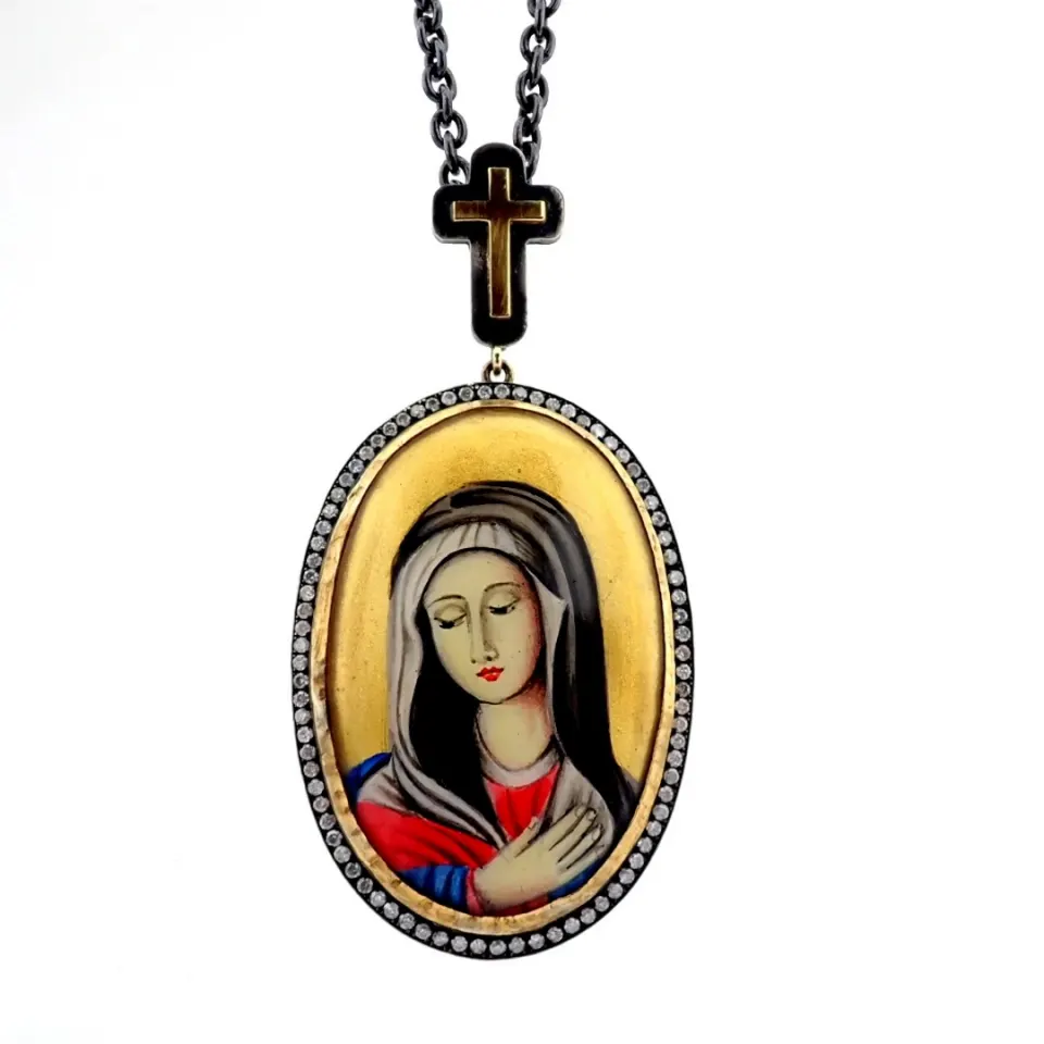 An exquisite necklace detailed with micro-art , brilliant diamonds and gold on silver