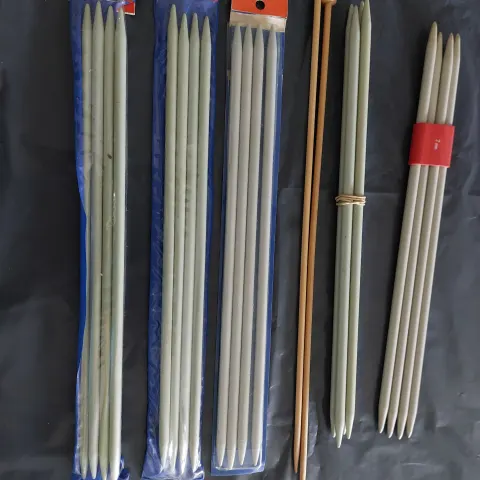 12 sets of knitting/wool needles