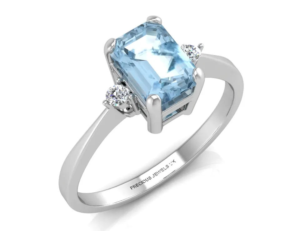 9ct White Gold Diamond And Emerald Cut Blue Topaz Ring (BT1.21) 0.04 Carats