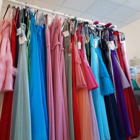 10 x prom dresses in various colours and styles and sizes.