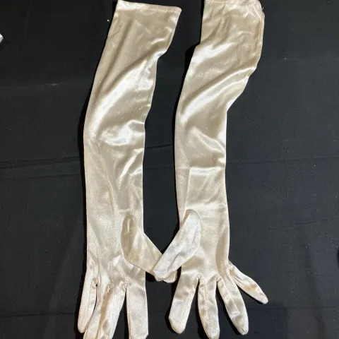 Gloves and costume jewellery used by Vanessa Hudgens