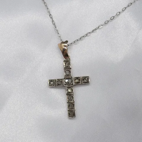 Antique, hand fashioned rose-cut diamond cross pendant in yellow gold and silver