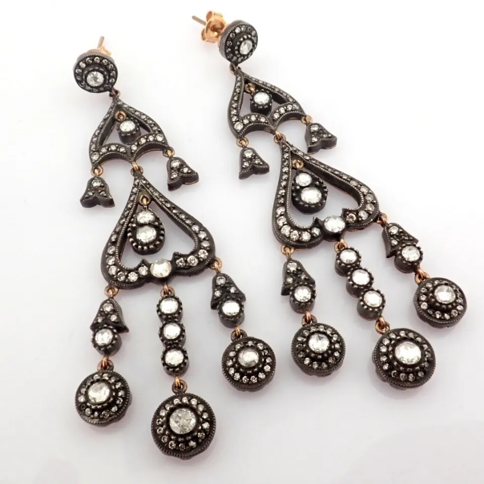 An Exquisite Old Earrings Detailed With Fancy Cut Diamonds and Gold In Silver
