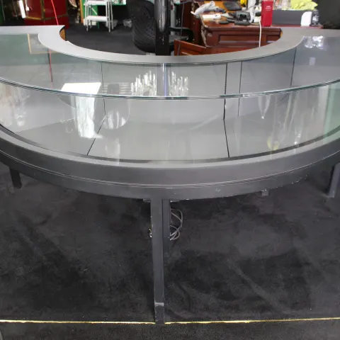Georg Jensen Showroom Cabinet in Curved Glass and Ebonised Steel