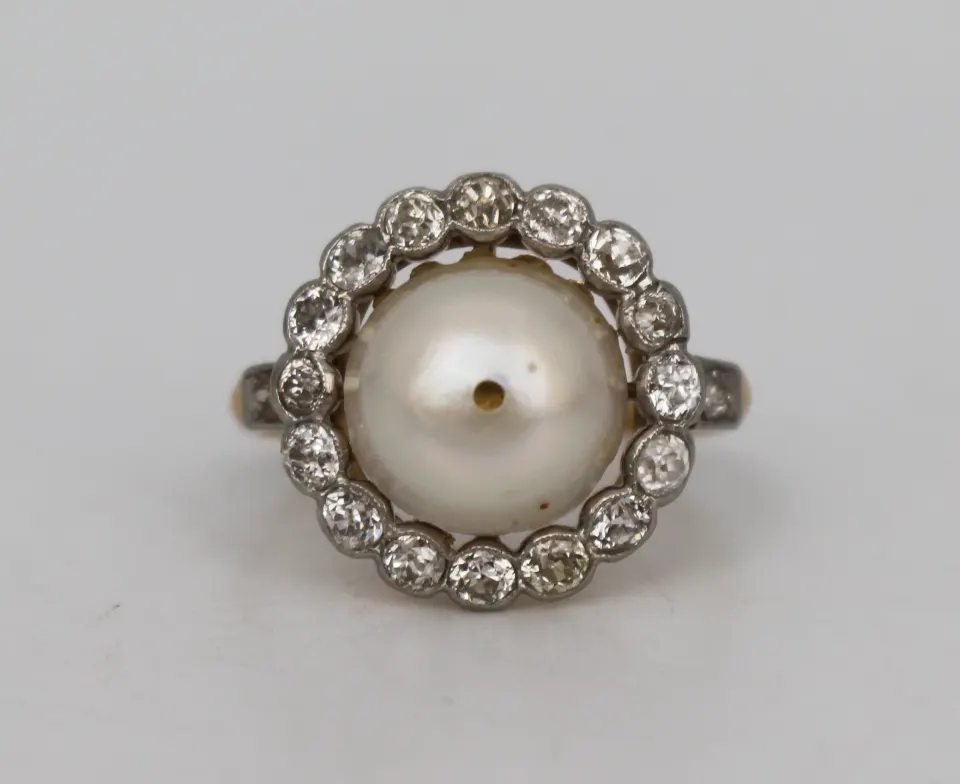 Pearl Set Ring with Diamond Surround