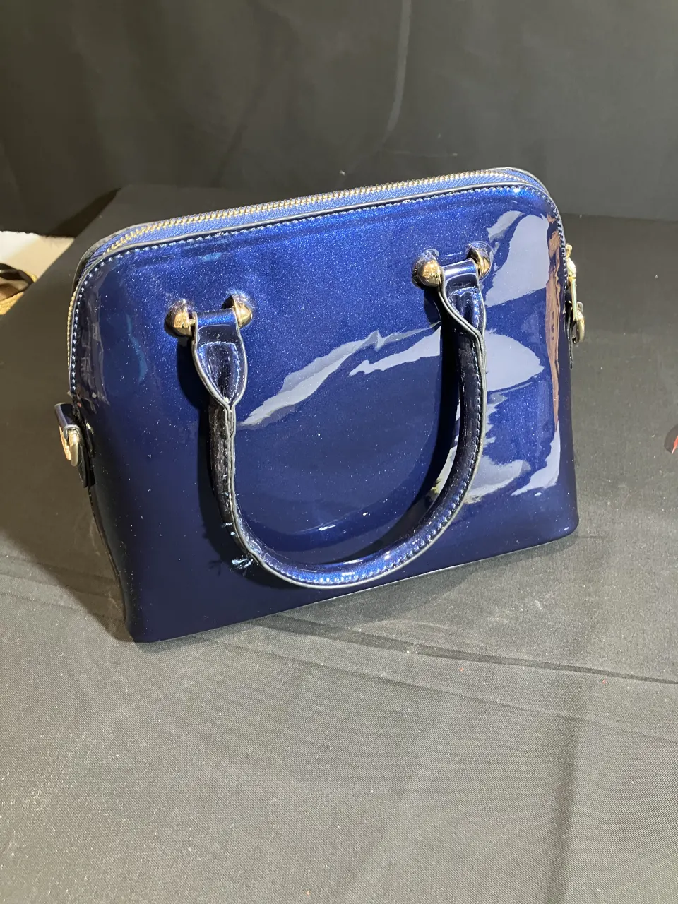 Blue Patent Handbag used by Vanessa Hudgens