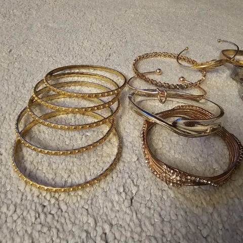 Lot of Gold Tone Bangles