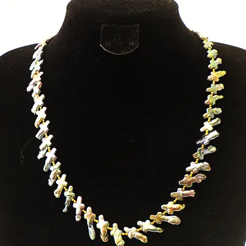 A Necklace With Rare Cross Shaped Natural Cultured Pearls