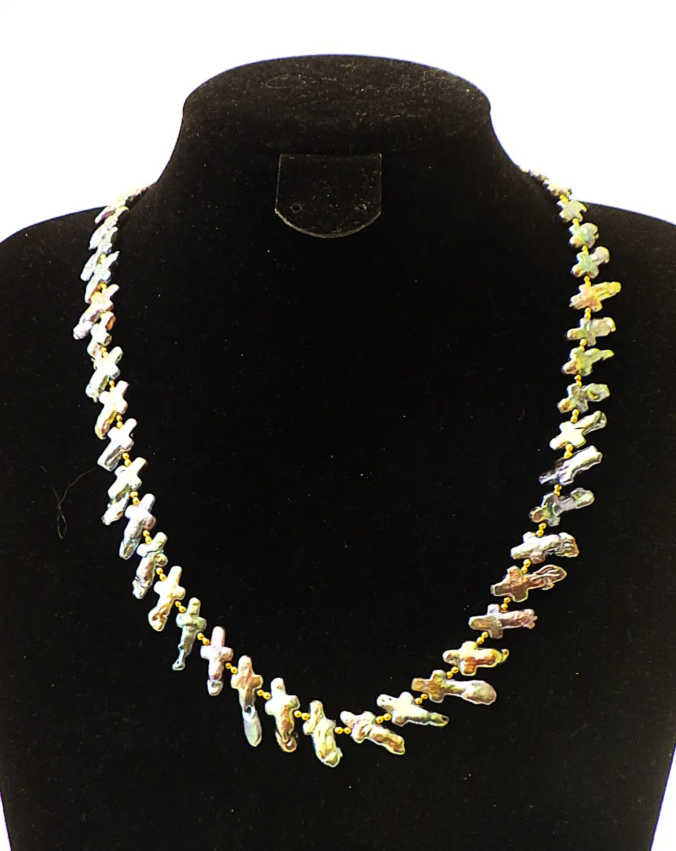 A Necklace With Rare Cross Shaped Natural Cultured Pearls