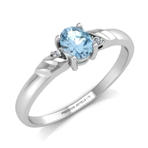 9ct White Gold Diamond And Blue Topaz Ring 0.01