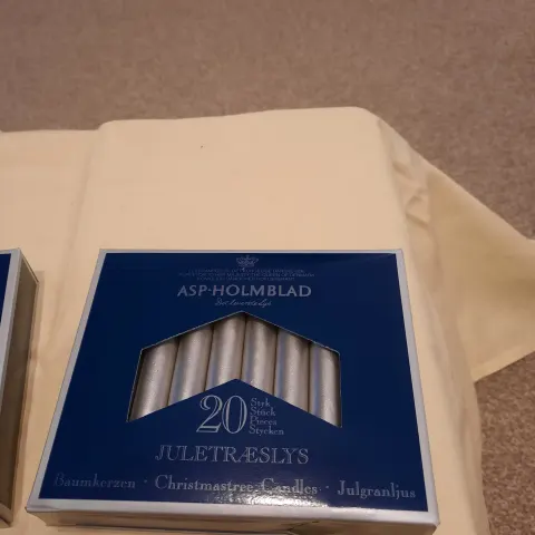 6 boxes of 10 silver candles small