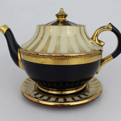 Decorative Lustre Terractotta Tea Pot on Stand
