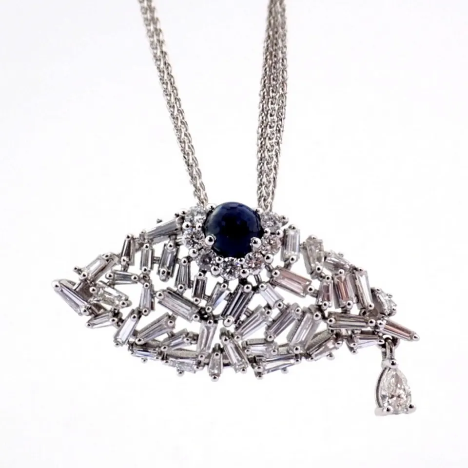An exquisite evil eye necklace detailed with brilliant diamonds and gold