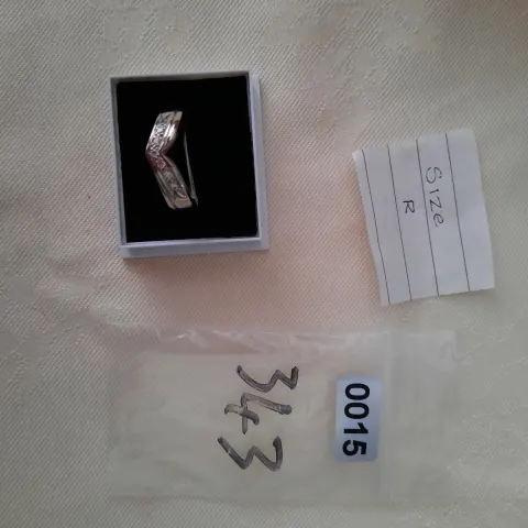 Rhodium plated set high quality CZ ring.  Size R. RRP £89  0015/343