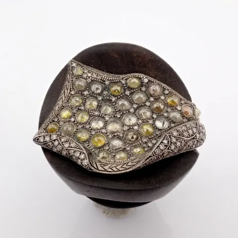 An exquisite  ebony ring detailed with brilliant diamonds and silver.