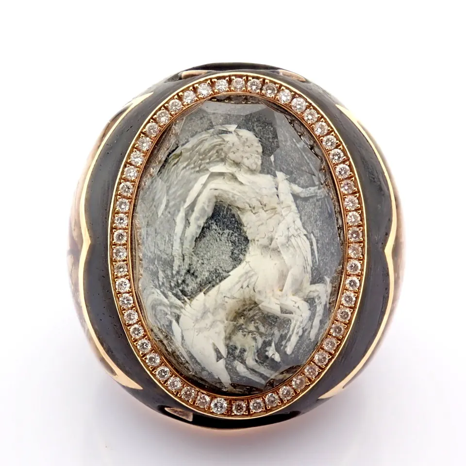 An Exquisite Ebony Ring Detailed With Topaz With Reversely Engraved Intaglio Mythological Centaur