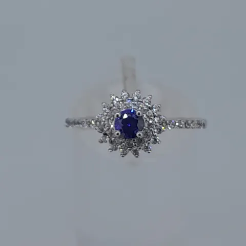 Silver Stamped 925 Dress Ring Set With CZ Stone, Centres Tone Measures 5.94 mm Diameter. Finger Siz