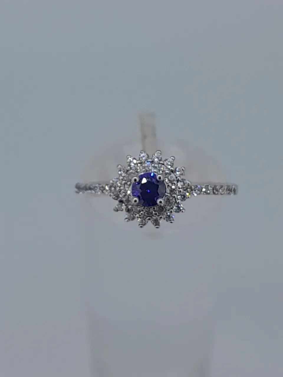 Silver Stamped 925 Dress Ring Set With CZ Stone, Centres Tone Measures 5.94 mm Diameter. Finger Siz