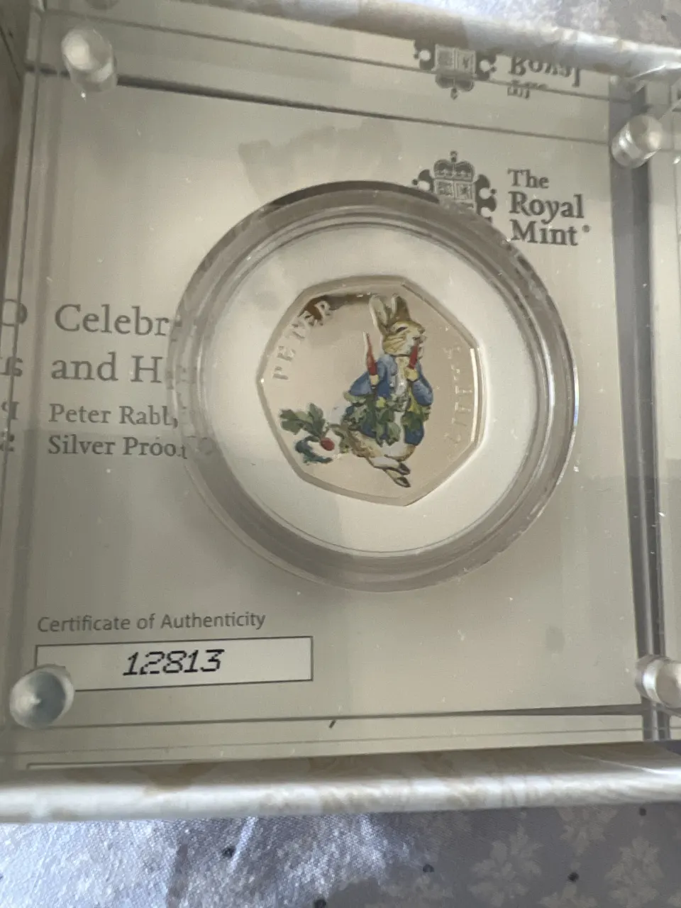 Silver. Peter Rabbit coloured coin