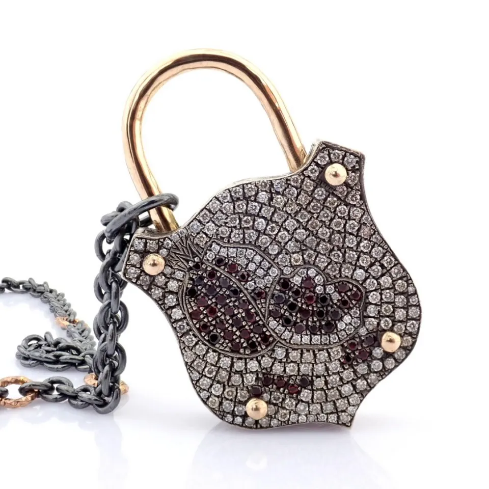 Convertible clasp necklace embellished with gold, colorful stones, and diamonds on silver