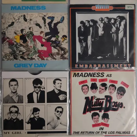 A Collection of 7x Madness 7” Vinyl Singles In Mainly VG+ Condition