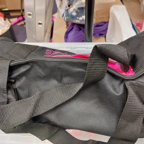 Black and pink holdall