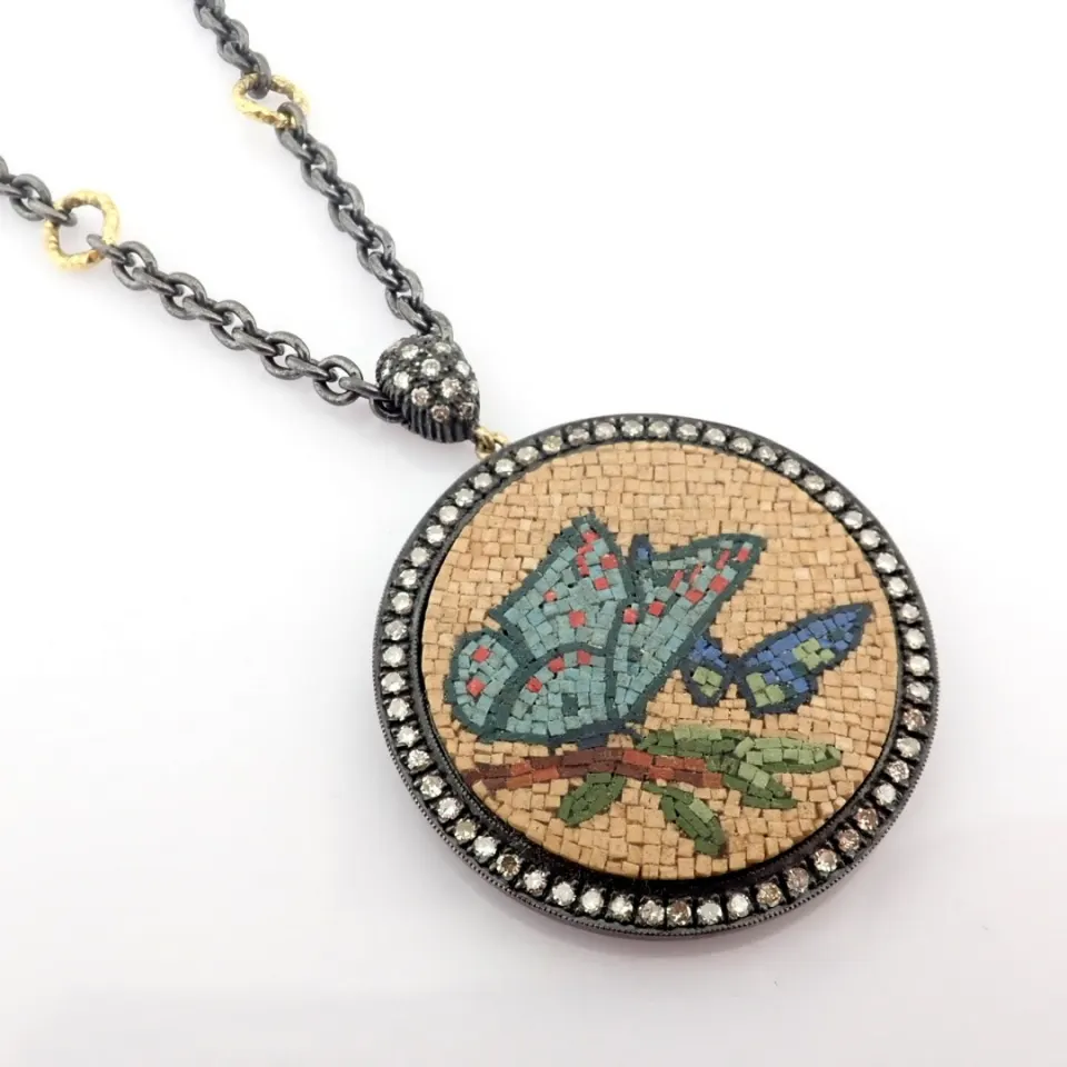 An exquisite 18k necklace detailed with micro-mozaic and brilliant diamonds