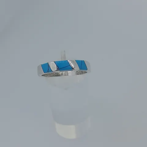 Silver and reconstituted turquoise ring