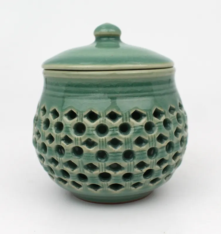 Chinese Celadon Glazed Pierced Jar with Lid