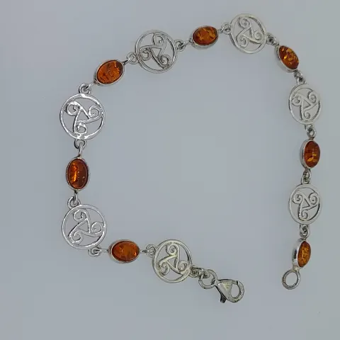 Silver and natural amber bracelet with alternating Celtic links