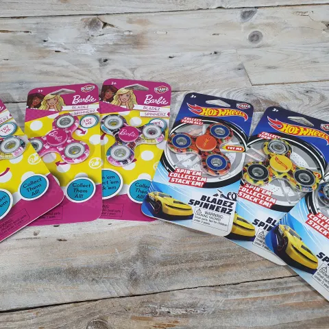 6 x Collectors Fidget Spinners. 3 x Barbie design and 3 x Hot Wheels design. Rrp £52