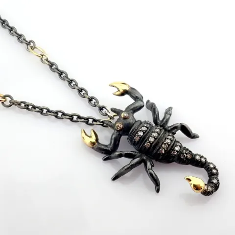 An Exquisite Scorpion Necklace Detailed With Brilliant Diamonds and Gold On Silver.