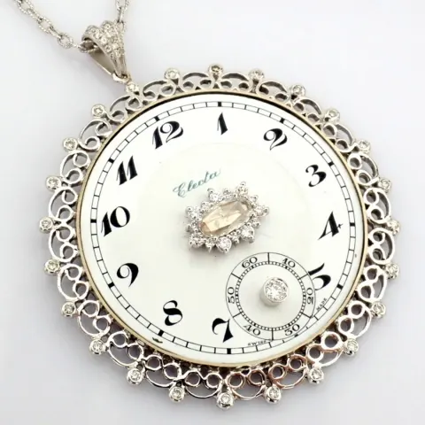 An Exquisite Necklace Made of Gold and Silver, Featuring An Antique Watch Dial Adorned With Diamonds