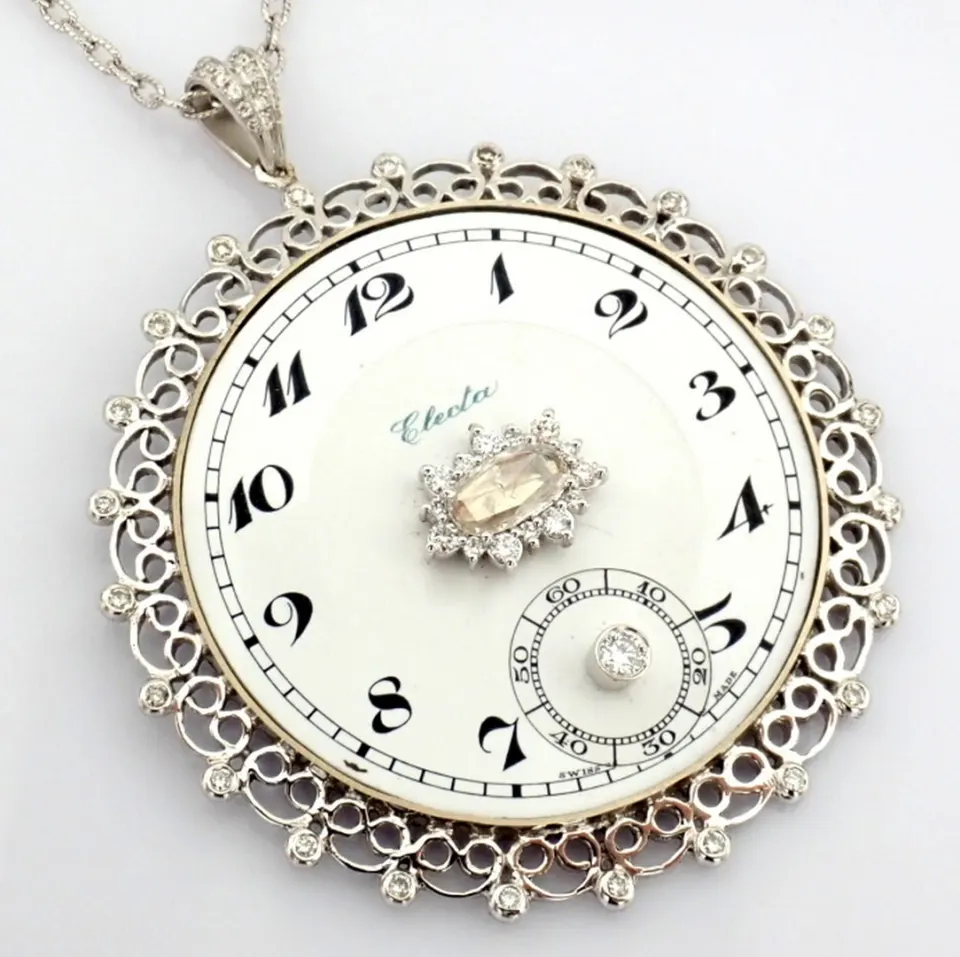 An Exquisite Necklace Made of Gold and Silver, Featuring An Antique Watch Dial Adorned With Diamonds