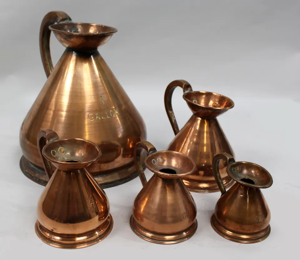 Set of 5 Antique Graduated Haystack Copper Jugs