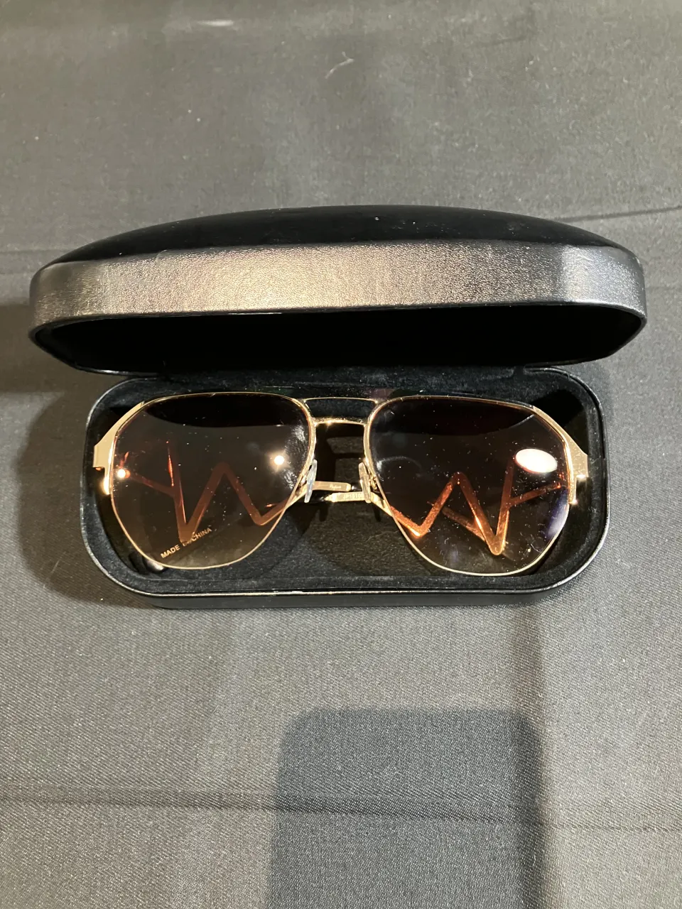 Coach sunglasses worn by Ricky Norwood